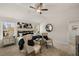 Main bedroom with king-size bed, armchairs, and a mirrored dresser at 565 Abbott Se Ct, Atlanta, GA 30354