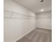 Large walk-in closet with wire shelving provides ample storage at 565 Abbott Se Ct, Atlanta, GA 30354