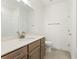 Modern bathroom with a sleek vanity, stylish fixtures, and a separate shower at 5235 Maggie Mae Ln, Cumming, GA 30028