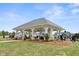 Open-air pavilion with seating, perfect for community gatherings and outdoor relaxation in the Franklin Goldmine neighborhood at 5235 Maggie Mae Ln, Cumming, GA 30028