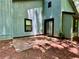 Back exterior of home with sliding glass doors leading to the patio at 5432 Post Road Pass, Stone Mountain, GA 30088
