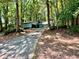 Find tranquility in this wooded community with easy access to your charming new home at 5432 Post Road Pass, Stone Mountain, GA 30088