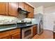 Kitchen boasts stainless steel appliances and granite countertops at 2930 Smith Ridge Trce, Peachtree Corners, GA 30071