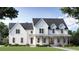 Charming new construction two-story home with a covered front porch and white siding at 841 Hickory Dr, Marietta, GA 30064