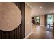 Elegant hallway showcasing a unique circular wall hanging at 742 Crossroad Ct, Powder Springs, GA 30127