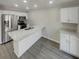 Kitchen featuring white cabinets, gray floors and stainless steel appliances at 6941 Gallant Se Cir # 10, Mableton, GA 30126