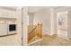 Upstairs hallway with laundry room and bedroom access at 2036 Broadmoor Way, Fairburn, GA 30213