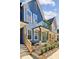 Inviting exteriors with covered porches and colorful siding in a new construction community at 1095 Tucker Ave # 106, Atlanta, GA 30310