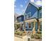 Charming new construction townhome features colorful siding and inviting front porch at 1095 Tucker Ave # 106, Atlanta, GA 30310