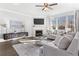 Bright and airy living room with fireplace, hardwood floors, and modern decor at 6045 Spring Way, Stonecrest, GA 30038