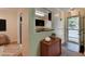 Foyer view featuring the front door, marble counter to kitchen and nearby coat closet at 102 Gettysburg Pl, Sandy Springs, GA 30350