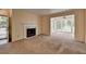 Living room features a fireplace and large windows at 102 Gettysburg Pl, Sandy Springs, GA 30350