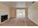 Living room features a fireplace and large windows at 102 Gettysburg Pl, Sandy Springs, GA 30350