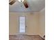 Neutral bedroom has carpet, a door to the exterior, and ceiling fan at 102 Gettysburg Pl, Sandy Springs, GA 30350