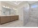 Bathroom featuring a double vanity, marble floors, and a spacious walk-in shower at 5245 Maggie Mae Ln, Cumming, GA 30028