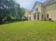 Large backyard with a grassy area and a pergola at 4503 Balmoral Nw Rd, Kennesaw, GA 30144