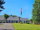 Ranch style home with gray shingle roof and landscaping at 4503 Balmoral Nw Rd, Kennesaw, GA 30144