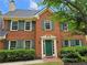 Brick home with green shutters and a welcoming entrance at 4503 Balmoral Nw Rd, Kennesaw, GA 30144