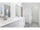 Double vanity bathroom with a soaking tub and shower at 5060 Trescott Path, Cumming, GA 30028