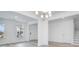 Bright dining room with hardwood floors and chandelier at 5060 Trescott Path, Cumming, GA 30028
