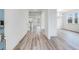 Bright entryway with hardwood floors, leading to living areas at 5060 Trescott Path, Cumming, GA 30028
