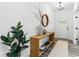 Stylish entryway featuring modern decor, wood accents, and ample natural light at 3378 Pepperpike Ct, Loganville, GA 30052