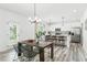 Bright kitchen and dining area with stainless steel appliances and modern finishes at 3378 Pepperpike Ct, Loganville, GA 30052