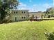 Expansive backyard featuring a deck and large green lawn at 2492 Brentwood Ct, Decatur, GA 30032