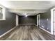 Spacious basement area with laminate floors, neutral paint, and recessed lighting at 2492 Brentwood Ct, Decatur, GA 30032