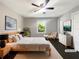 Serene primary bedroom with a ceiling fan, neutral tones, and a view of the backyard at 2492 Brentwood Ct, Decatur, GA 30032