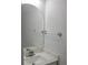 Elegant bathroom features a sleek mirror, pristine white sink and modern fixtures at 1041 Kennesborough Nw Rd, Kennesaw, GA 30144