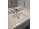 Bathroom vanity featuring a marble countertop and modern faucet at 1041 Kennesborough Nw Rd, Kennesaw, GA 30144