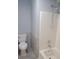 Bathroom with toilet and shower with modern shower head at 1041 Kennesborough Nw Rd, Kennesaw, GA 30144