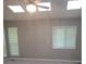 Bedroom featuring vaulted ceilings, skylights, and modern light fixture at 1041 Kennesborough Nw Rd, Kennesaw, GA 30144