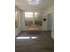 Sunroom featuring hanging swing, natural lighting, and wood-look floors at 1041 Kennesborough Nw Rd, Kennesaw, GA 30144