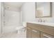 Clean bathroom with vanity, toilet and shower/tub combo at 4010 Village Run Dr, Mcdonough, GA 30252