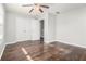 Well-lit bedroom, offering ample closet space and wood floors at 4010 Village Run Dr, Mcdonough, GA 30252