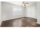Charming bedroom with wood floors, double closets and window at 4010 Village Run Dr, Mcdonough, GA 30252