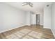 Bedroom with wood-look flooring and ceiling fan at 4010 Village Run Dr, Mcdonough, GA 30252