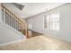Bright dining room with tile floors and view of hardwood living area at 4010 Village Run Dr, Mcdonough, GA 30252