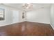 Living room featuring hardwood floors and neutral walls at 4010 Village Run Dr, Mcdonough, GA 30252