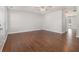Spacious living room with hardwood floors and ceiling fan at 4010 Village Run Dr, Mcdonough, GA 30252