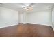 Living room with hardwood floors and ceiling fan at 4010 Village Run Dr, Mcdonough, GA 30252