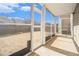 Cozy screened porch overlooking backyard at 4010 Village Run Dr, Mcdonough, GA 30252