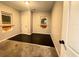 Spacious bedroom with dark flooring and ample closet space at 781 Peyton Nw Ave, Atlanta, GA 30318