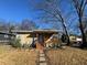 Newly renovated house with a front porch and stone pathway at 781 Peyton Nw Ave, Atlanta, GA 30318