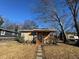 Front view of a charming house with a porch and landscaping at 781 Peyton Nw Ave, Atlanta, GA 30318