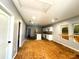 Open living area with new flooring and kitchen island at 781 Peyton Nw Ave, Atlanta, GA 30318