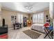 Inviting bedroom with neutral tones, shutters, ceiling fan, and comfortable furnishings at 2493 Oldfield Nw Rd, Atlanta, GA 30327