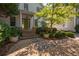 Elegant home with a stone walkway, columns, and verdant landscaping at 2493 Oldfield Nw Rd, Atlanta, GA 30327